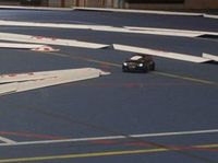Circuit de voiture radiocommand�s avec rails