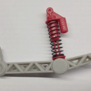 Bras oscillant arrière gauche et amortisseur pour Nikko 1/14 Elite Truck