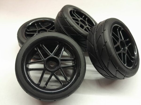 Roues complètes "12 batons noires" avec pneus slick pour Nikko Super Evolution 1/10